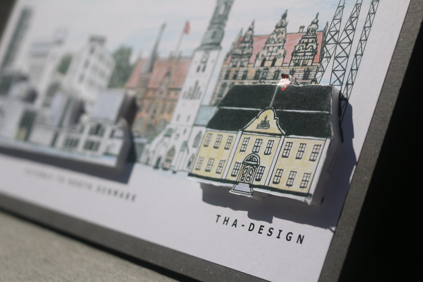 Håndtegnet 3D by-motiv af Aalborg